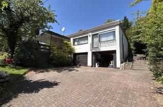 Einfamilienhaus kaufen in 66539 Neunkirchen, Neunkirchen/Wellesweiler - Sanierungsbedürftiger Bungalow aus Nachlass mit Wintergarten und 2 Garagen - aktuell vermietet