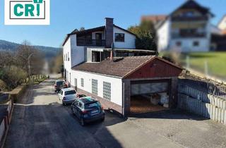 Haus kaufen in 35260 Stadtallendorf, Stadtallendorf-Wolferode - Zweifamilienhaus mit Gewerbe in idyllischer Lage von Stadtallendorf