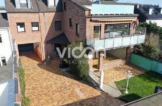 Wohnung kaufen in 50374 Erftstadt, Erftstadt - Eigentumswohnung mit eigenem Garten und Garage im Zentrum