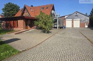 Haus kaufen in 27798 Hude, Hude - Gewerbehalle + MFH und Baureserve