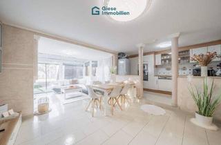 Wohnung kaufen in 70794 Filderstadt, Filderstadt - Moderne Wohnung mit Garten und Wintergarten