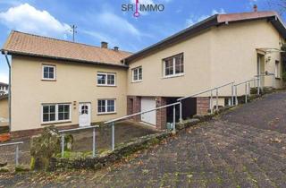 Einfamilienhaus kaufen in 54636 Baustert, Baustert - Wohnen mit Perspektive: Haus mit zwei Wohnungen in Baustert