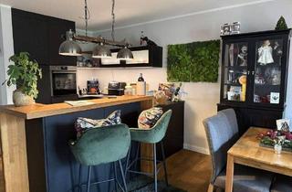 Wohnung kaufen in 26203 Wardenburg, Wardenburg - Moderne Zwei-Zimmer-Erdgeschosswohnung mit großer Terrasse und Garten in Wardenburg