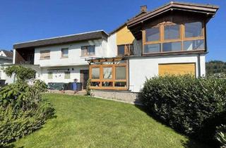 Haus kaufen in 35716 Dietzhölztal, Dietzhölztal - Mandeln: Geräumige Immobilie mit Gewerbeeinheit