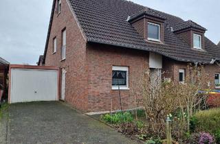 Doppelhaushälfte kaufen in 46519 Alpen, Alpen - Doppelhaushälfte mit einer Garage in 46519 Menzelen-Ost