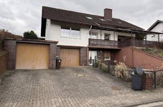 Einfamilienhaus kaufen in 63654 Büdingen, Büdingen - Charmantes Einfamilienhaus in ruhiger Feldrandlage