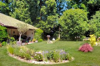 Reihenhaus kaufen in 82031 Grünwald, Grünwald - Familienhaus mit ca. 1.000 m² Garten auf gewachsenem Grundstück