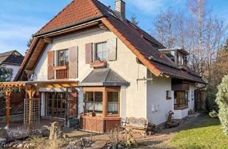 Einfamilienhaus kaufen in 31848 Bad Münder, Bad Münder - Wohnen mit Perspektive, Wintergarten und Doppelgarage!