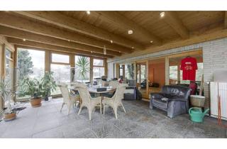 Haus kaufen in 49143 Bissendorf, Bissendorf - Zweifamilienhaus in Bissendorf mit Wintergarten