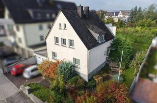 Einfamilienhaus kaufen in 56410 Montabaur, Montabaur - Charmantes Einfamilienhaus mit lichtdurchflutetem Anbau und großem Raumangebot