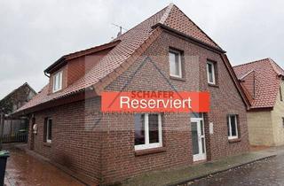 Haus kaufen in 27243 Harpstedt, Harpstedt - Zweifamilienhaus in zentraler Wohngegend zu verkaufen