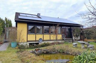 Haus kaufen in 96163 Gundelsheim, RESERVIERT - Wohnen auf einer Ebene: Komfortabler Bungalow mit Sauna, Garage und Photovoltaik in 96163 Gundelsheim!