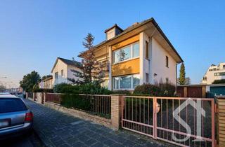 Haus kaufen in 63165 Mühlheim, Charmantes Zweifamilienhaus in begehrter Lage in Mühlheim am Main