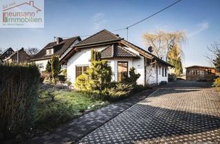 Haus kaufen in 53547 Siebenmorgen, Gepflegter Bungalow mit zwei Gartenhäusern, Terrasse und großem Grundstück in Siebenmorgen