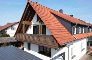 Wohnung kaufen in 63584 Gründau, Fast wie ein eigenes Haus – charmante Maisonette-Wohnung mit Kamin, Balkon & Dachstudio