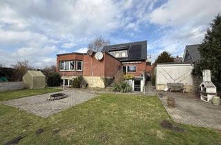 Einfamilienhaus kaufen in 24235 Lutterbek, Großzügiges Einfamilienhaus mit Einliegerwohnung, PV-Anlage und 889 m² Grundstück