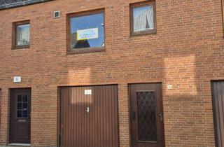 Haus kaufen in 25554 Wilster, Gatermann Immobilien: Reihenmittelhaus mit Garage in Wilster an der Wilster Au