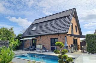 Einfamilienhaus kaufen in 21641 Apensen, hochwertiges 4-Zimmer-Einfamilienhaus (KfW 70) mit PV-Anlage, Außenpool und Doppelcarport