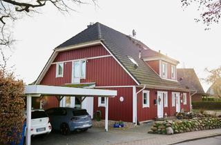 Doppelhaushälfte kaufen in 25436 Moorrege, Wohnen mit Charme - Doppelhaushälfte im Landhausstil in Moorrege