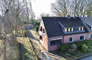 Doppelhaushälfte kaufen in 49843 Uelsen, Gepflegte Zweifamilien-Doppelhaushälfte in beliebter Lage von Uelsen