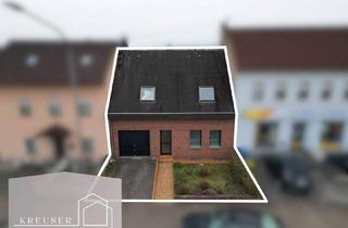 Einfamilienhaus kaufen in 66740 Saarlouis, Saarlouis - Großzügiges Einfamilienhaus mit Südgarten, 4 Schlafzimmern, Balkon & Garage nahe Saarpolygon