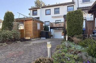 Haus kaufen in 28844 Weyhe, Weyhe - Zentral wohnen in Leeste: Gepflegtes Reihenmittelhaus mit Wintergarten und Garage!