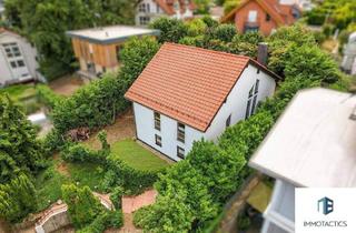 Einfamilienhaus kaufen in 55543 Bad Kreuznach, Bad Kreuznach - Architektonisches Unikat in bester Lage- Großzügiges Einfamilienhaus mit Studio, Kamin & Garten