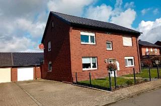 Haus kaufen in 59394 Nordkirchen, Nordkirchen - Freistehendes Zweifamilienhaus in ruhiger Lage mit 3 Garagen