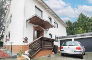 Haus kaufen in 55286 Wörrstadt, Wörrstadt - Charmantes Zwei- bis Dreifamilienhaus mit grüner Oase und hervorragender Lagequalität in Wörrstadt