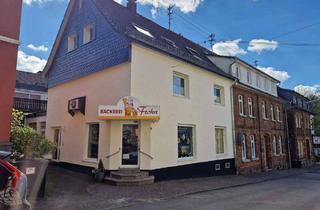 Haus kaufen in 53804 Much, Much - Im Herzen von Much: Wohn-Geschäftshaus mit Gewerbeeinheit und zwei Wohnungen
