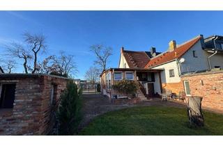 Doppelhaushälfte kaufen in 14712 Rathenow, Rathenow - Doppelhaushälfte in Rathenow mit großem Grundstück zu verkaufen!