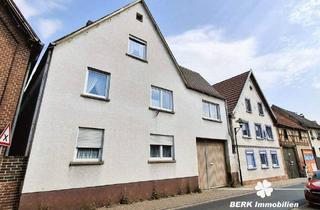 Haus kaufen in 63853 Mömlingen, Mömlingen - BERK Immobilien - Vielseitiges Zweifamilienhaus mit großem Potenzial in Mömlingen