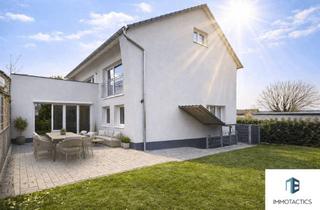 Wohnung kaufen in 55543 Bad Kreuznach, Neuwertige Erdgeschosswohnung mit Terrasse, Garten und zwei Carport-Stellplätzen in Bad Kreuznach