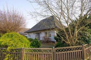 Haus kaufen in 26826 Weener, Zuhause in Weener: Großzügiger Bungalow mit Garten, Teich und überdachter Terrasse