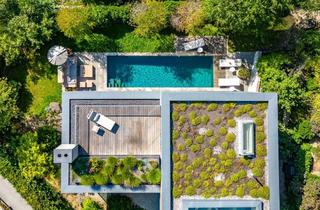 Villa kaufen in 81925 Bogenhausen, Architekten-Villa mit hochklassiger Ästhetik, Spa-Bereich und Pool in einzigartiger Lage