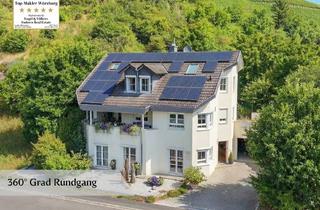 Einfamilienhaus kaufen in 97282 Retzstadt, Wohnen auf höchstem Niveau: Großzügiges Einfamilienhaus am Fuße der Weinberge