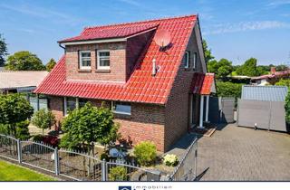 Haus kaufen in 26624 Südbrookmerland, Exklusives Ferienhaus in traumhafter Kanallage am Großen Meer!