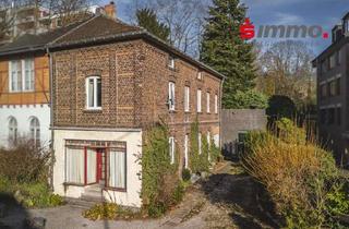 Einfamilienhaus kaufen in 52072 Laurensberg, Bezugsfreies Einfamilienhaus mit Ladenlokal und großem Grundstück im Zentrum von Aachen-Laurensberg