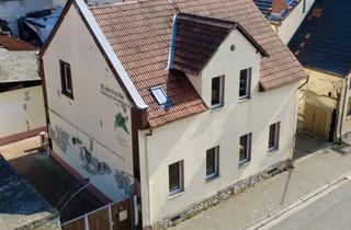 Haus kaufen in Hauptstraße 83, 67583 Guntersblum, Attraktives Ein- bis Zweifamilienhaus mit Potenzial für Familien und Kapitalanleger