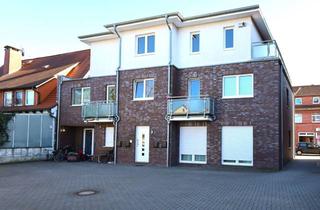 Haus kaufen in 27356 Rotenburg, Modernes Stadthaus mit vier großzügigen Wohneinheiten in zentraler Lage