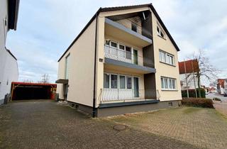 Haus kaufen in 76756 Bellheim, Drei-Familienhaus mit Doppelgarage, Carports und Garten - zur sofortigen Nutzung