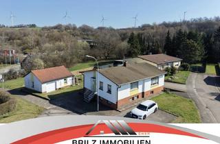 Haus kaufen in 66629 Freisen, Bungalow mit sep. Einliegerwohnung & sonnigem Garten