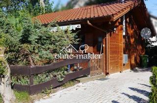 Haus kaufen in 23974 Stove, Blockbohlen-Ferienhäuschen aus Altersgründen für €134.000 zu veräußern