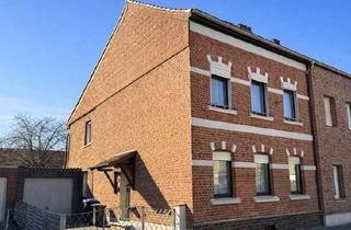 Doppelhaushälfte kaufen in 52499 Baesweiler, Doppelhaushälfte mit großem Garten und viel Potenzial in zentraler Lage von Baesweiler