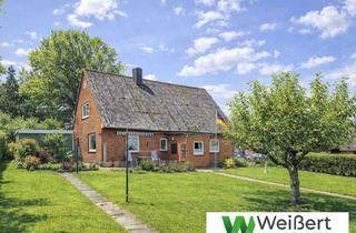 Haus kaufen in 25587 Münsterdorf, Großes Eckgrundstück mit rund 1.000 m², EFH und Option auf Neubebauung