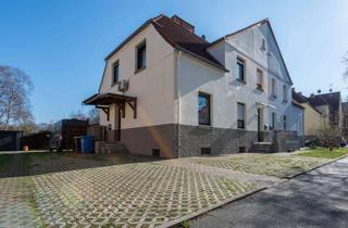 Doppelhaushälfte kaufen in 45327 Katernberg, Wohnen im Grünen: Doppelhaushälfte mit zwei Wohneinheiten und Gartenidylle