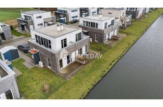Haus kaufen in 26969 Butjadingen, Butjadingen - Zweitwohnsitz zum Wohlfühlen: exklusives Ferienhaus mit Terrasse, Balkon und Garten