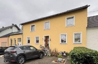Haus kaufen in 54668 Alsdorf, Alsdorf - Zweifamilienhaus mit schönem Gartengrundstück.