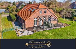 Einfamilienhaus kaufen in 26349 Jade, Jade - Modernisiertes Einfamilienhaus mit Wintergarten und großem Grundstück