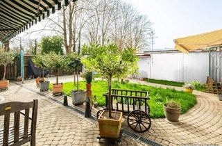 Haus kaufen in 79110 Freiburg, Freiburg im Breisgau - Vielseitig nutzbarer L - Bungalow in Massivbauweise mit Photovoltaik und hochwertiger Ausstattung